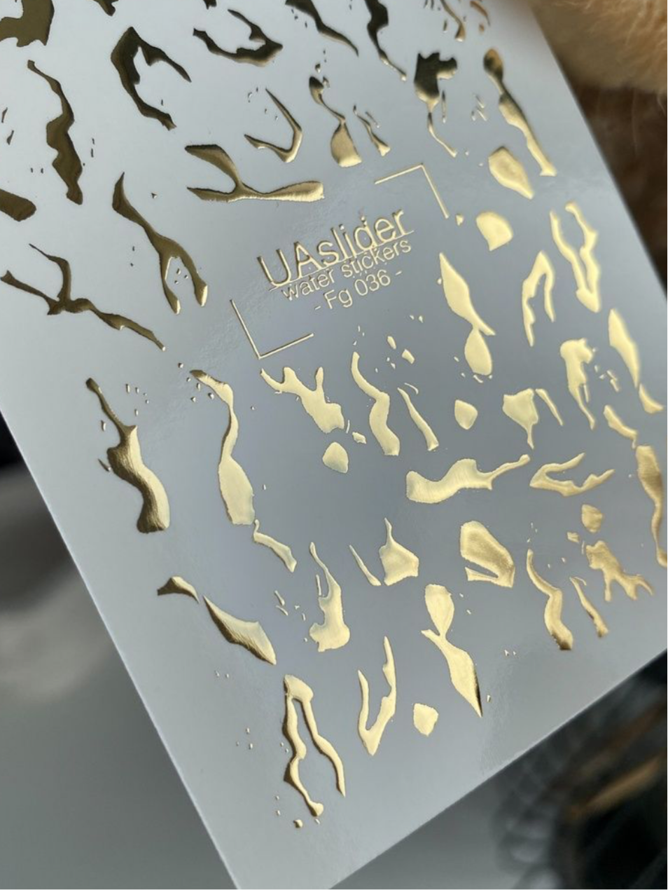 Slider-Design „Fg 036“ – Abstrakte Goldfolien-Spuren