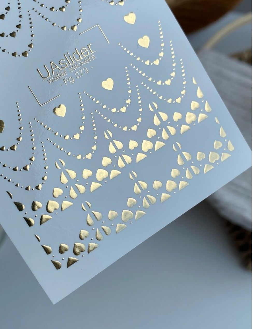 UA Slider FG 273 – Goldene Herzen & Linien
